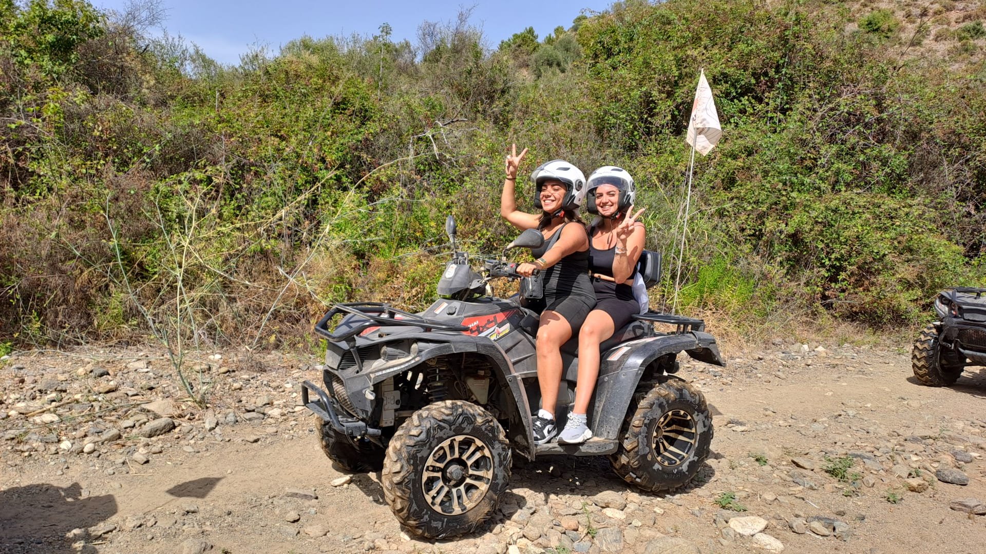 Happy customers enjoying a quad tour gift experience in Marbella