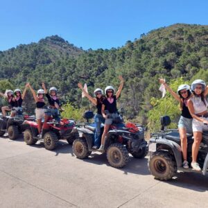 Hen party group cheering on quads in the mountains of Marbella